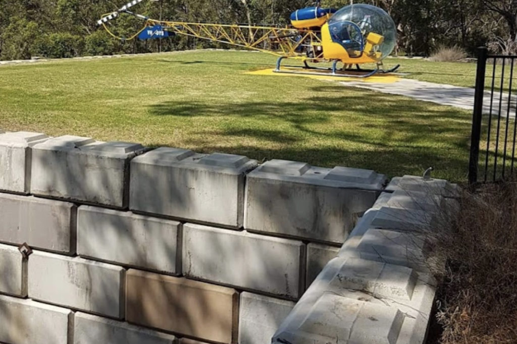 Retaining wall with cement blocks for helipad