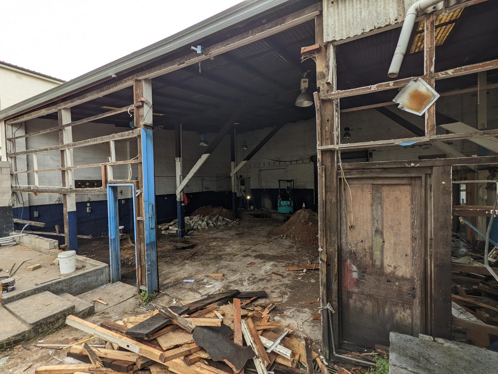 Early stages of demolition, 10m3 hook skip bin dimensions, construction skip bin hire