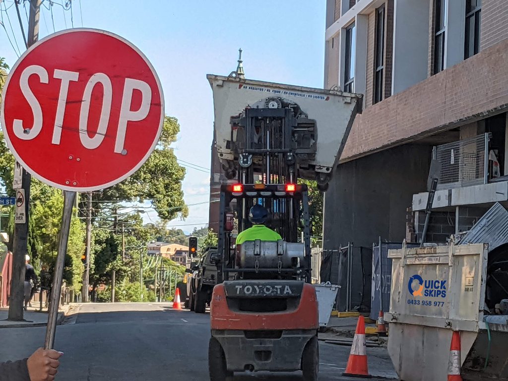 Rubbish Skip Bin in forklift clamp near me, Skip bin removal service from construction sites in Campsie