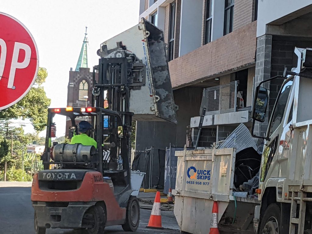 vertical skip clamp using forklift extension, Rubbish Skip Bins near me, Skip bin removal service