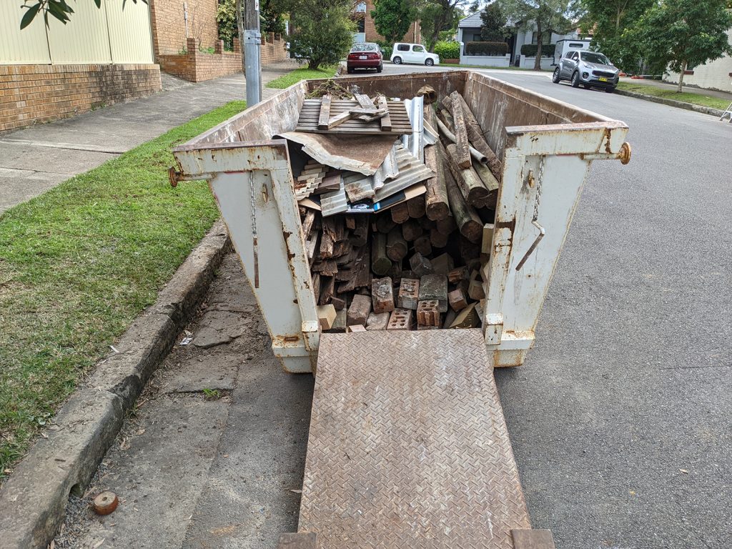 Walk in Skip Bin HIred with Door open and affordable